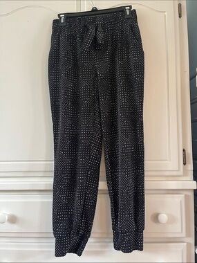 Polka dot patterns dress pants with cuffed bottoms